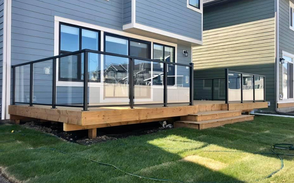 Pool-side deck with glass railings