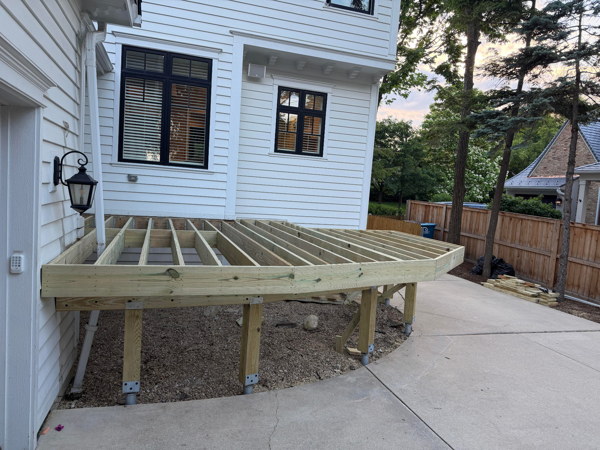 Pressure-treated deck framing and joists during repair